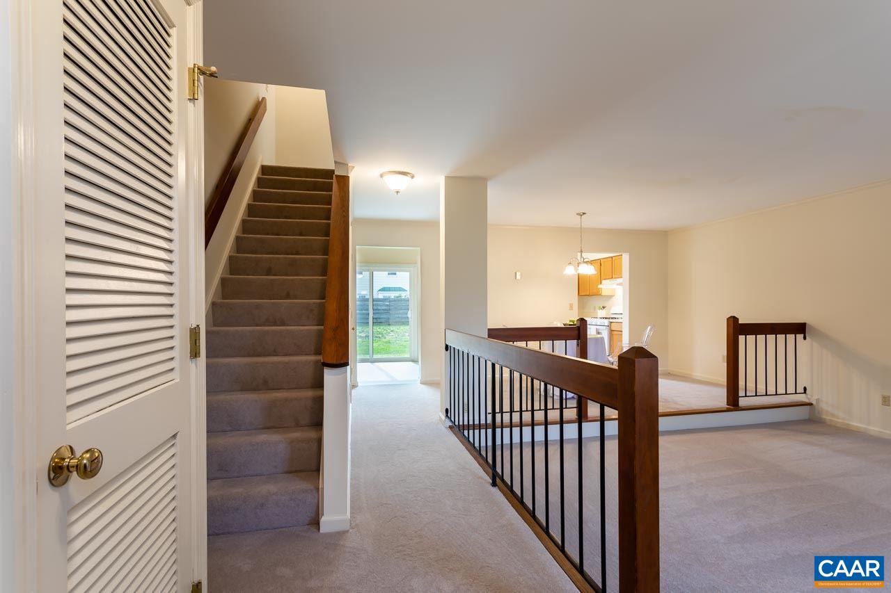 1509 Minor Ridge Court Charlottesville, VA 22901 - Photo 4 of 20 a view of a hallway with windows