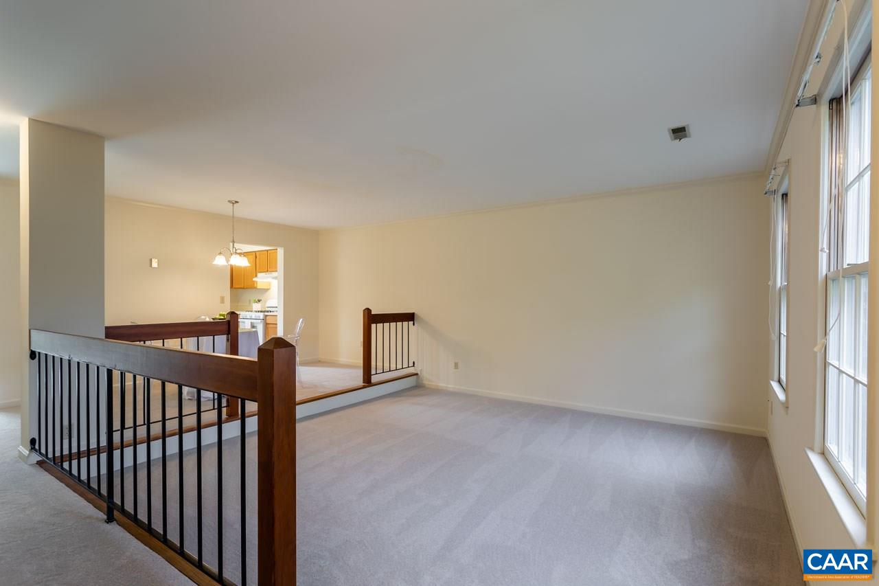 1509 Minor Ridge Court Charlottesville, VA 22901 - Photo 5 of 20 a view of a livingroom with a balcony
