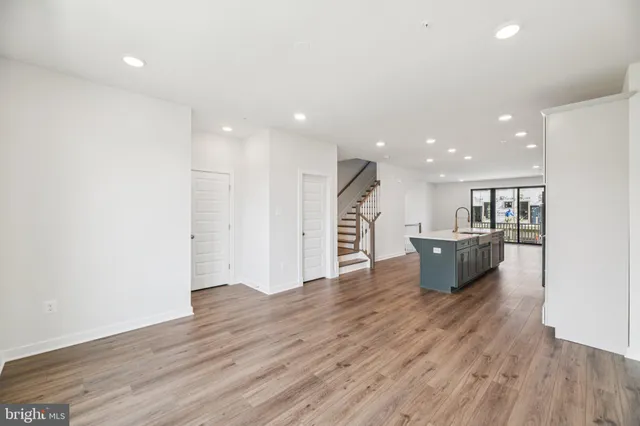 a view of kitchen with wooden floor