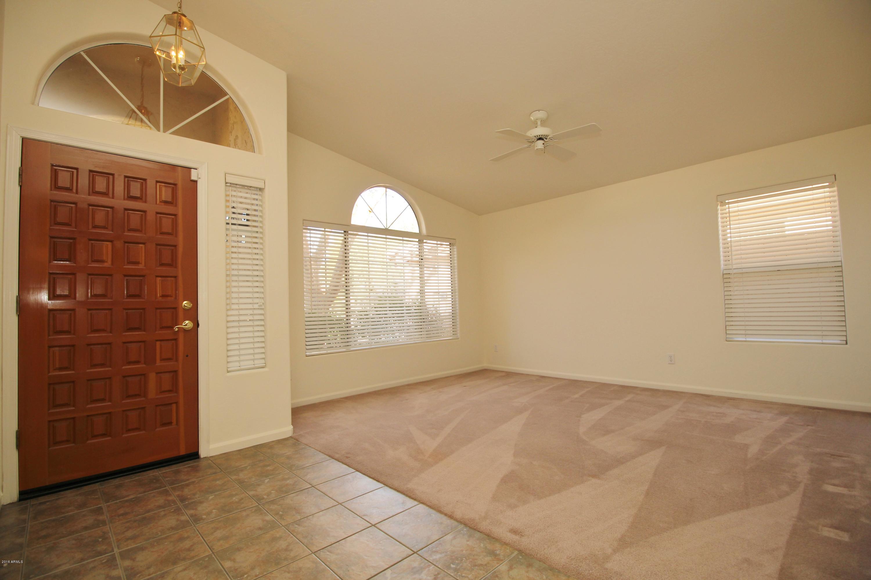 3563 East Utopia Road Phoenix, AZ 85050 - Photo 7 of 15 6-3563 E Utopia Living Room