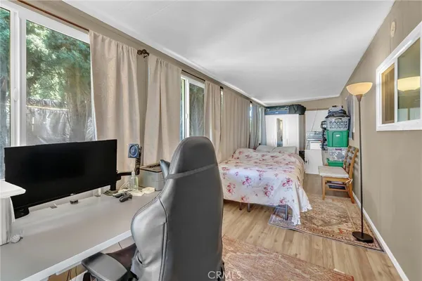 a workspace with furniture and window