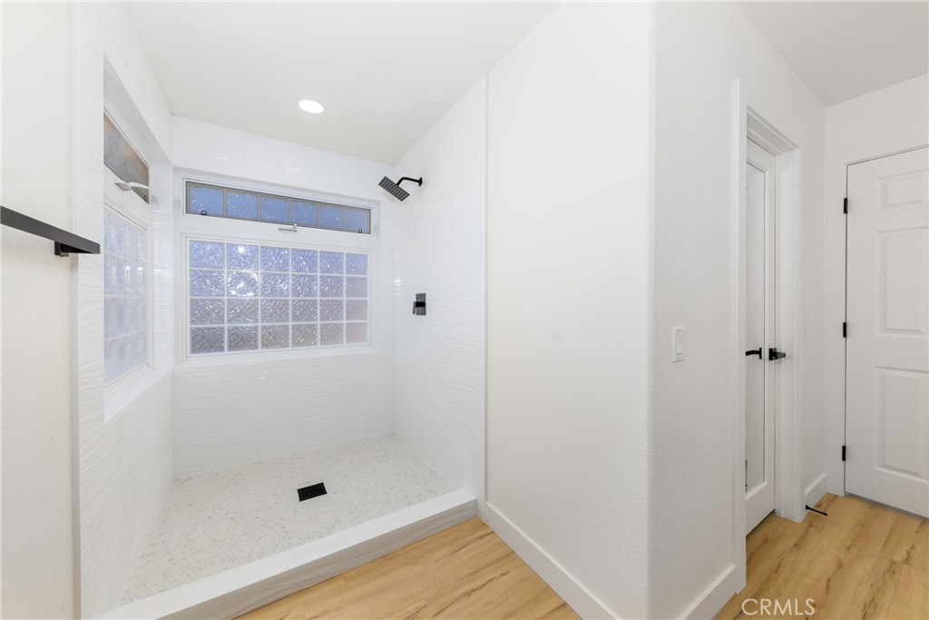 16322 Pick Place Riverside, CA 92504 - Photo 22 of 35 a bathroom with a shower