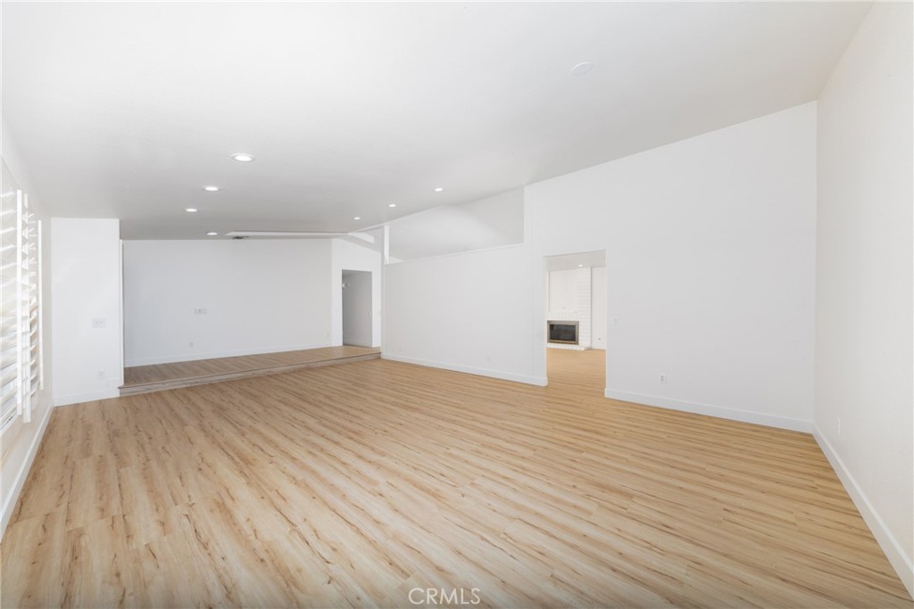 16322 Pick Place Riverside, CA 92504 - Photo 7 of 35 a view of empty room with wooden floor