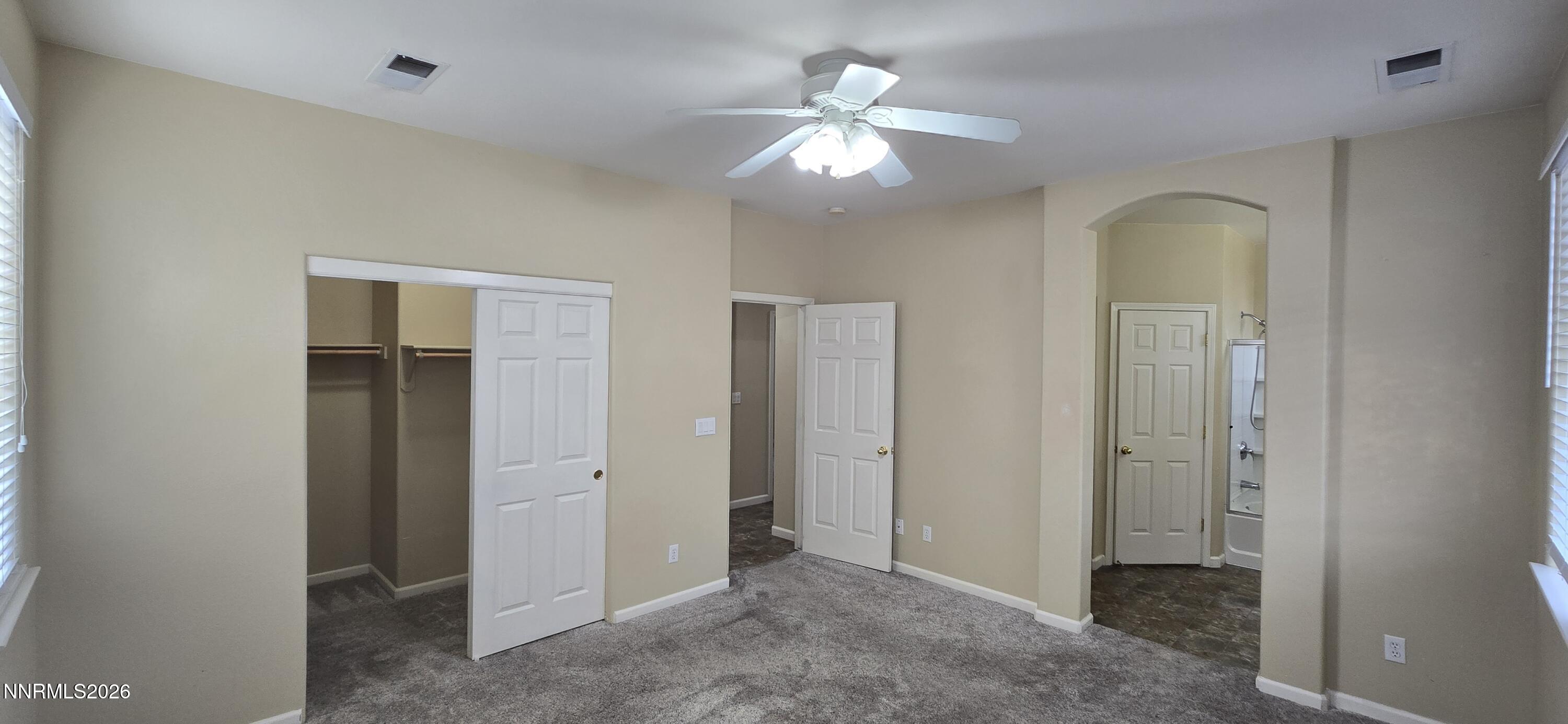 10210 Robilee Drive Reno, NV 89521 - Photo 21 of 56 wooden floor in an empty room with a window