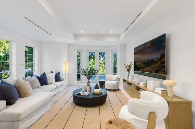 a spacious bathroom with a large tub and shower