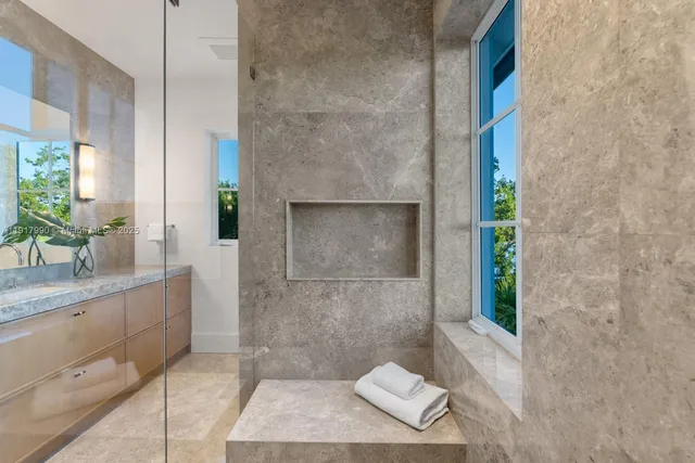 a view of porch with a bench