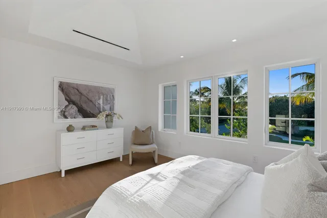 a view of a hallway with washer and dryer