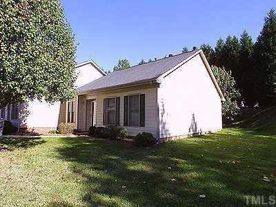 6700 Twin Tree Court Raleigh, NC 27613 - Photo 1 of 1 a view of a house with backyard