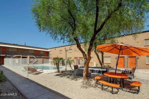swimming pool with outdoor seating