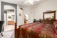 a bedroom with a bed and furniture