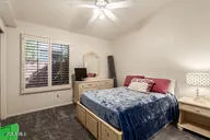 a view of a bathroom with a shower and a sink