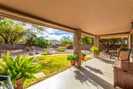 a view of a swimming pool with an outdoor space