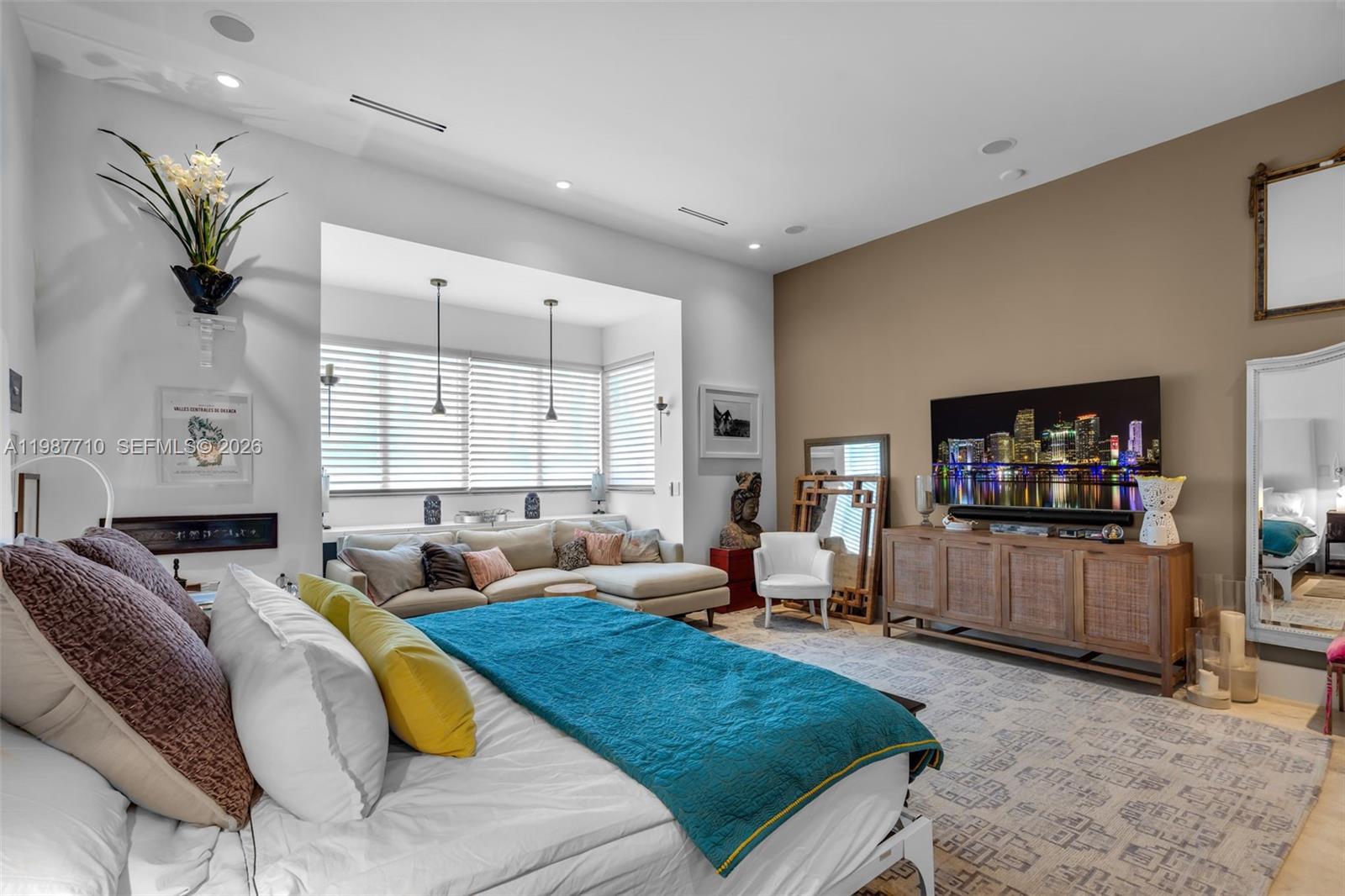 140 Hampton Lane Key Biscayne, FL 33149 - Photo 15 of 43 a living room with furniture and a flat screen tv