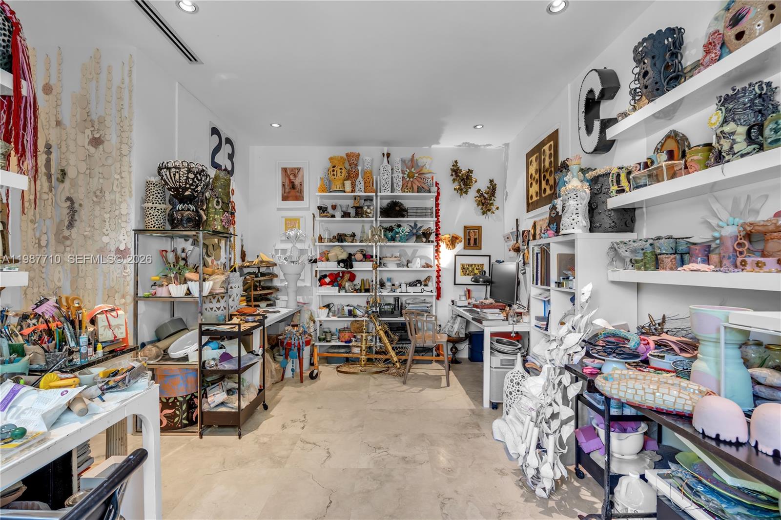140 Hampton Lane Key Biscayne, FL 33149 - Photo 23 of 44 This bedroom features two open areas, providing ample space for a roommate or another primary bedroom.