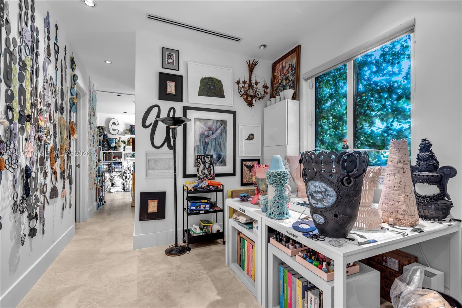 140 Hampton Lane Key Biscayne, FL 33149 - Photo 24 of 44 This bedroom features two open areas, providing ample space for a roommate or another primary bedroom.