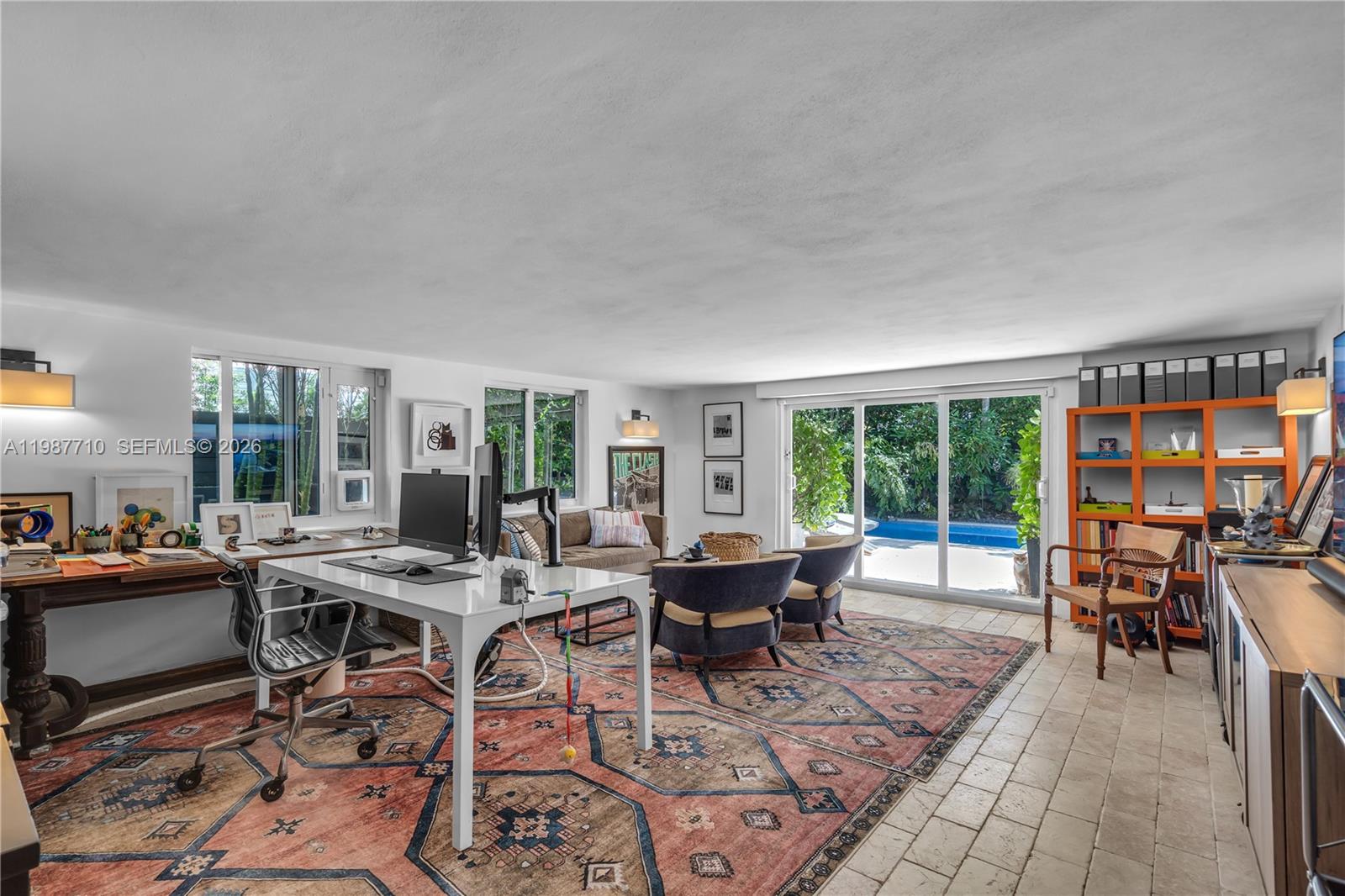 140 Hampton Lane Key Biscayne, FL 33149 - Photo 31 of 44 This space is perfect for multiple uses, including a den, pool cabana, and office. It comes with a full bathroom and plenty of room for a gym.