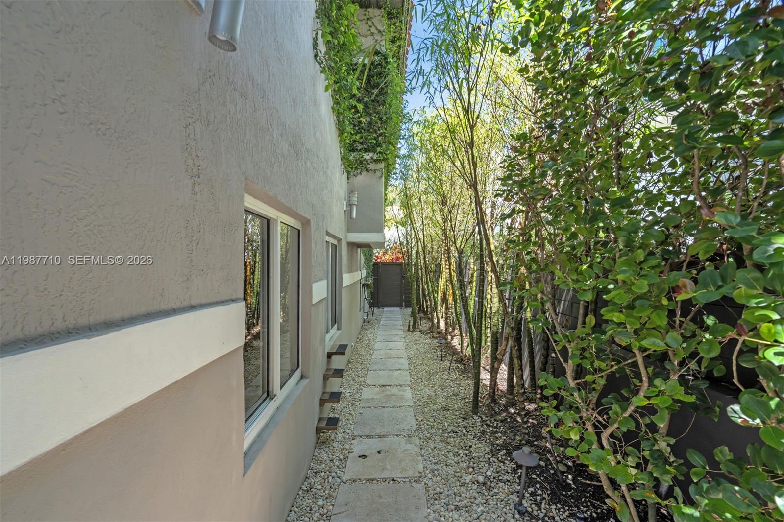 140 Hampton Lane Key Biscayne, FL 33149 - Photo 39 of 44 The exterior of the house is meticulously maintained.