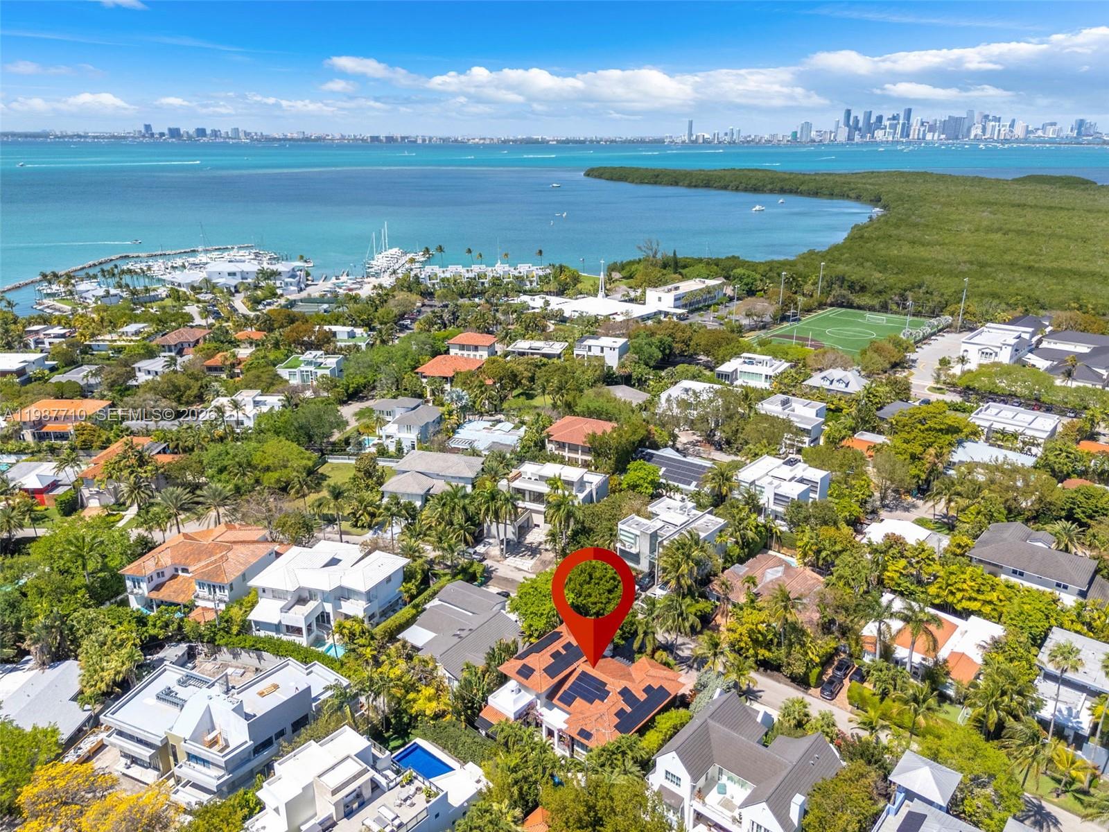 140 Hampton Lane Key Biscayne, FL 33149 - Photo 42 of 43 a view of a lake with houses in the back