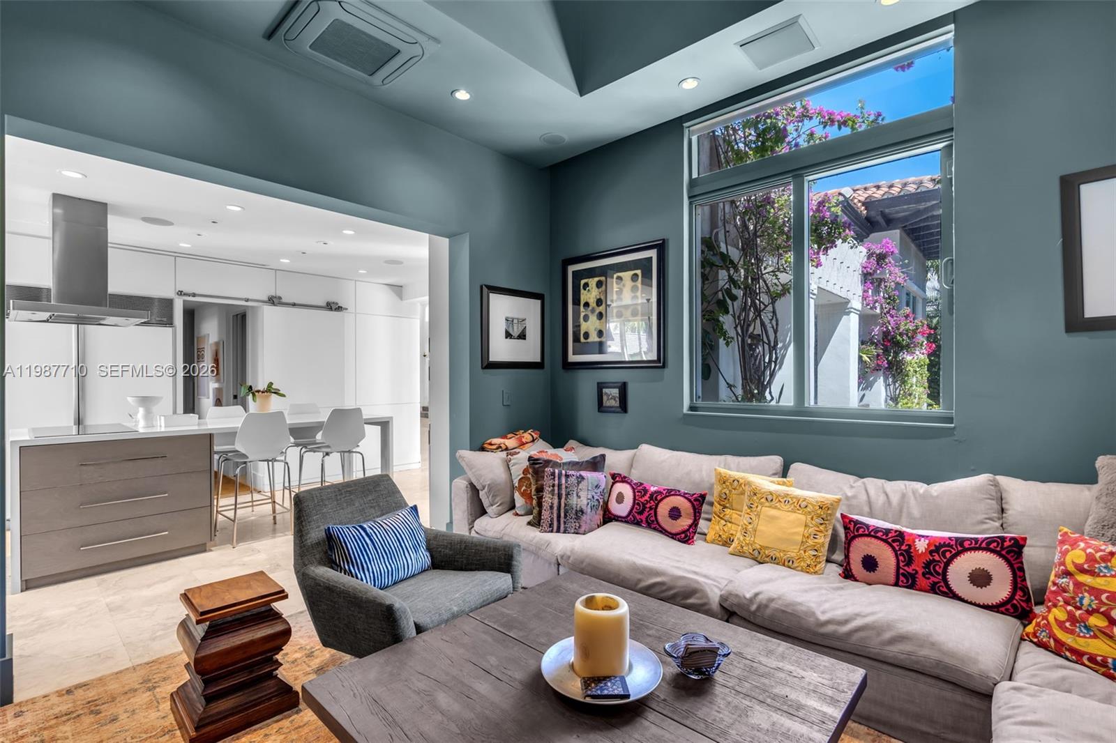 140 Hampton Lane Key Biscayne, FL 33149 - Photo 7 of 44 A spacious family room conveniently located adjacent to the kitchen.