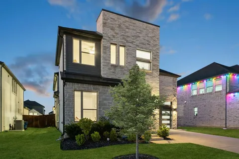 a front view of house with yard