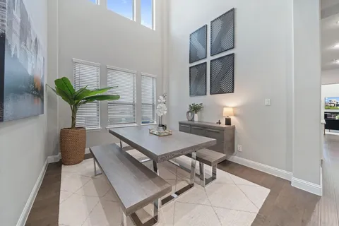 a view of a workspace with furniture