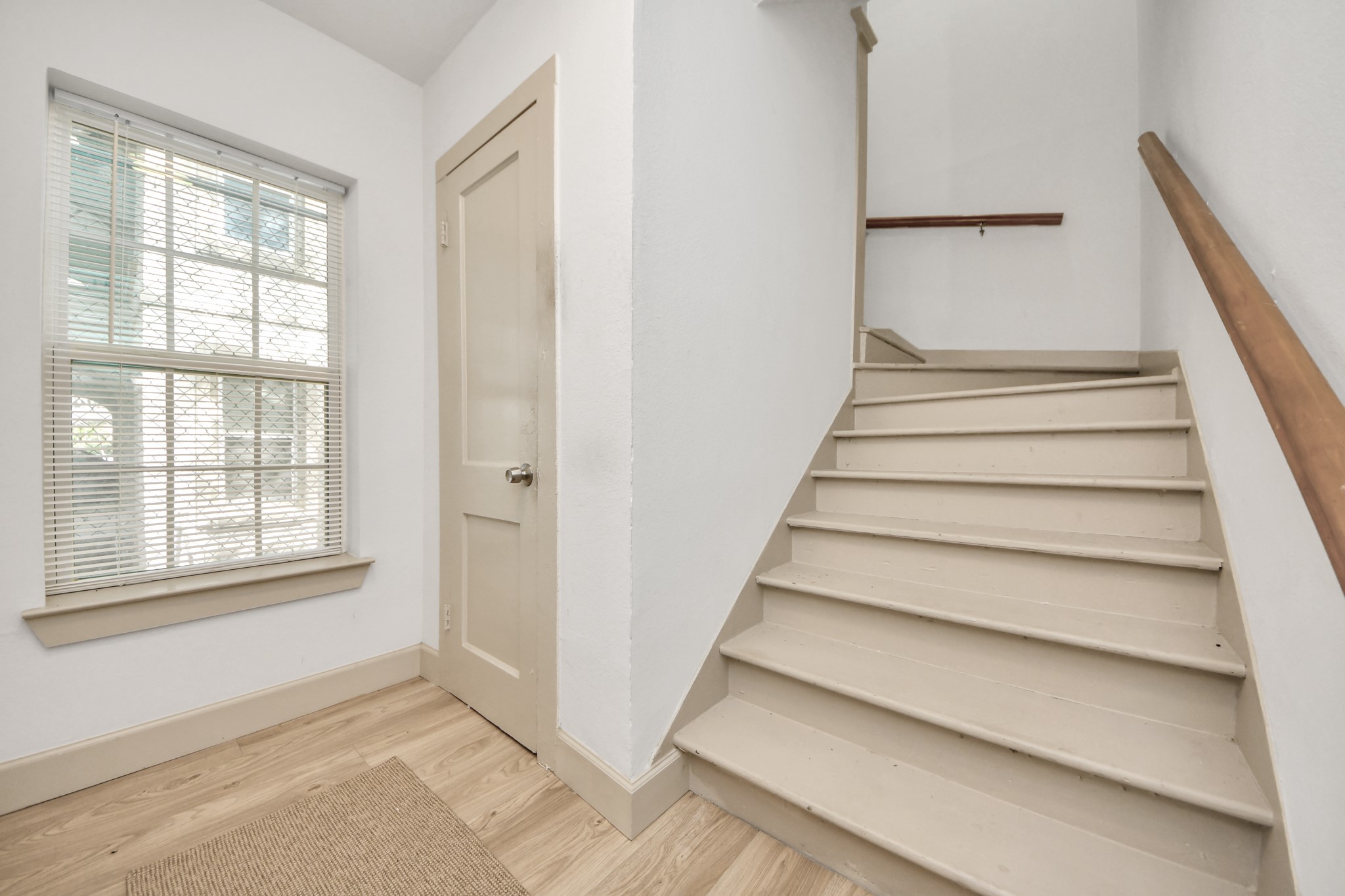 2919 Rosedale Street, Unit B Houston, TX 77004 - Photo 7 of 35 a view of an entryway with staircase