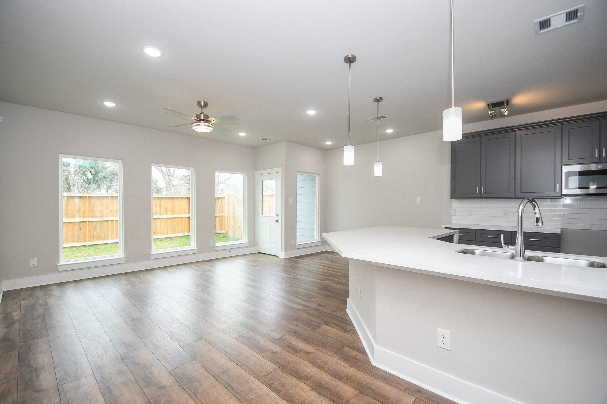 4401 Alvin Street, Unit B Houston, TX 77051 - Photo 3 of 19 a view of a kitchen and a sink wooden floor