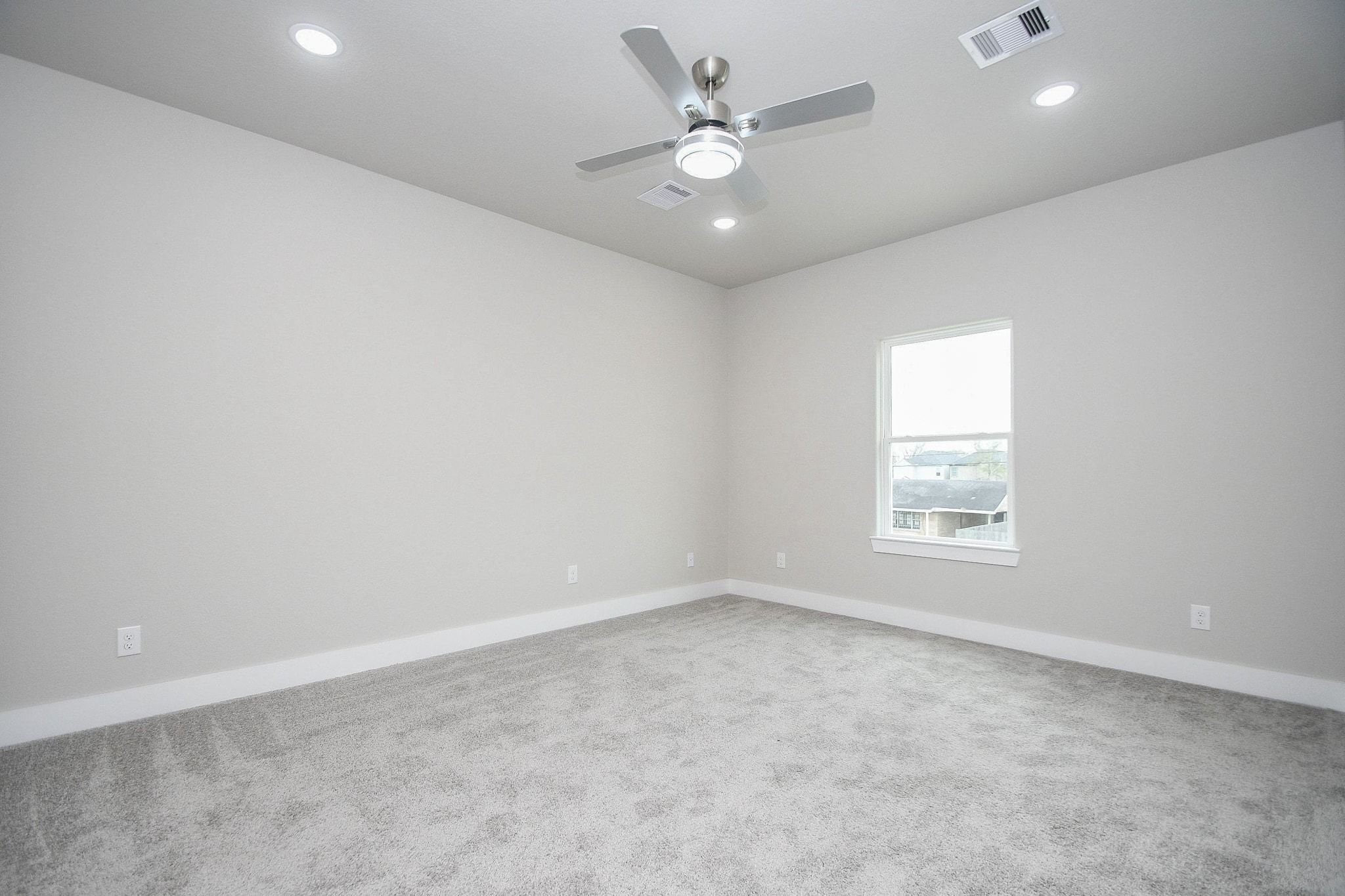 4401 Alvin Street, Unit B Houston, TX 77051 - Photo 9 of 19 wooden floor in an empty room with a window