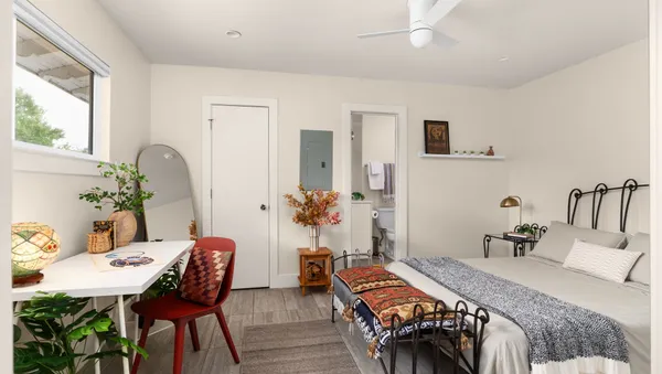 a bedroom with furniture and a bed