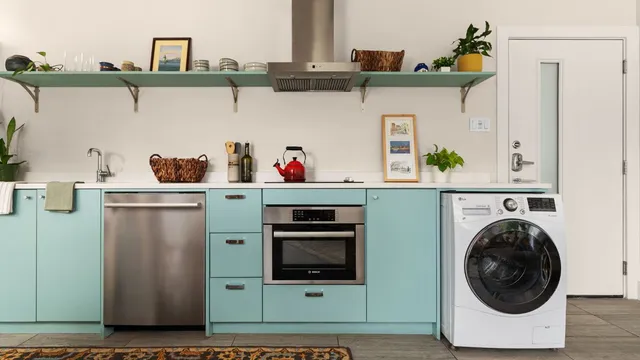a utility room with dryer and washer