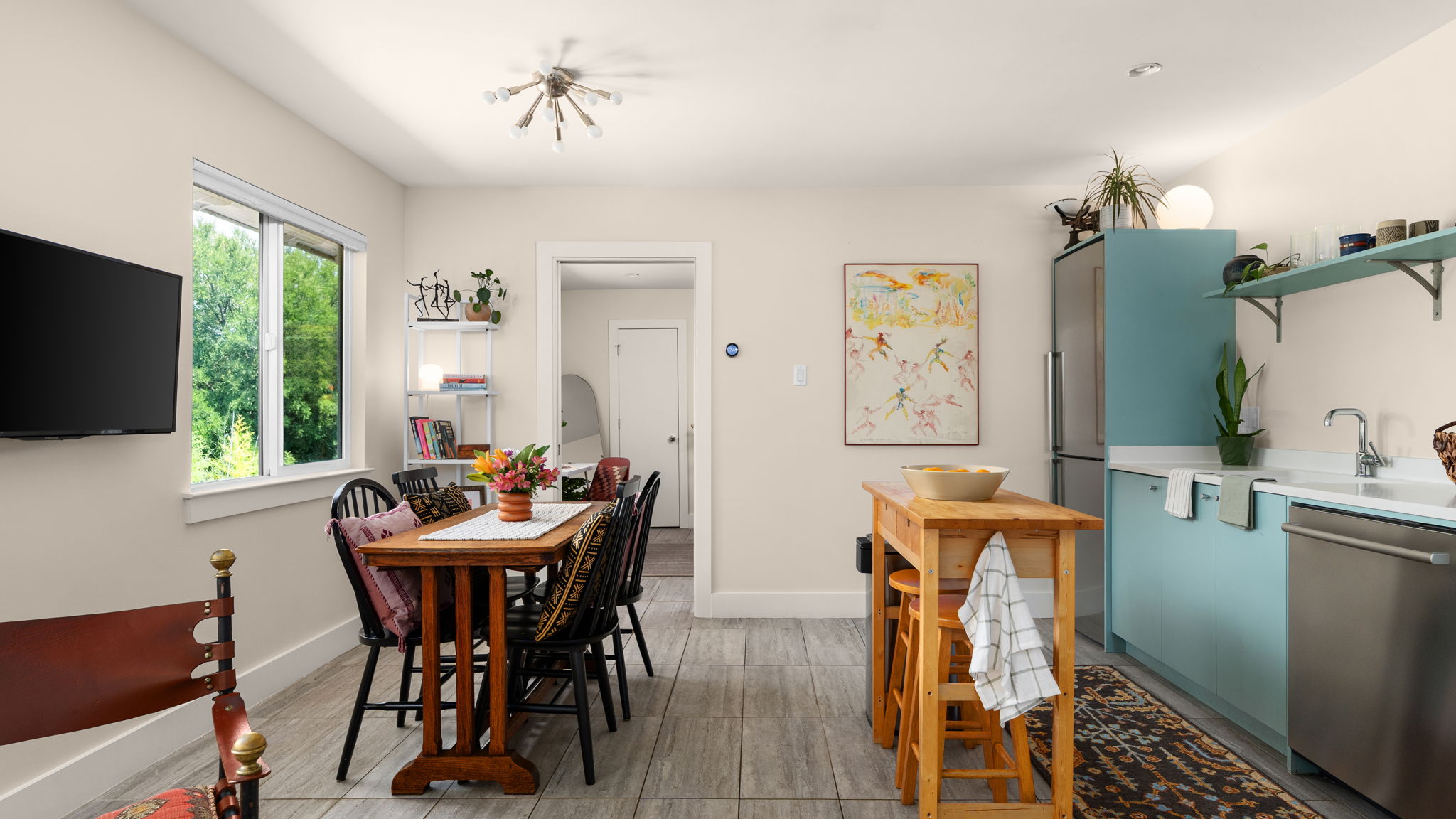 1208 Enfield Road, Unit 204 Austin, TX 78703 - Photo 7 of 21 a dining room with furniture and window