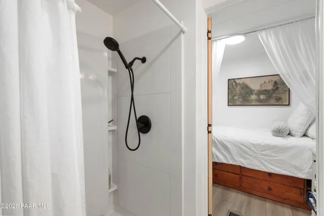 a bathroom with a sink and mirror