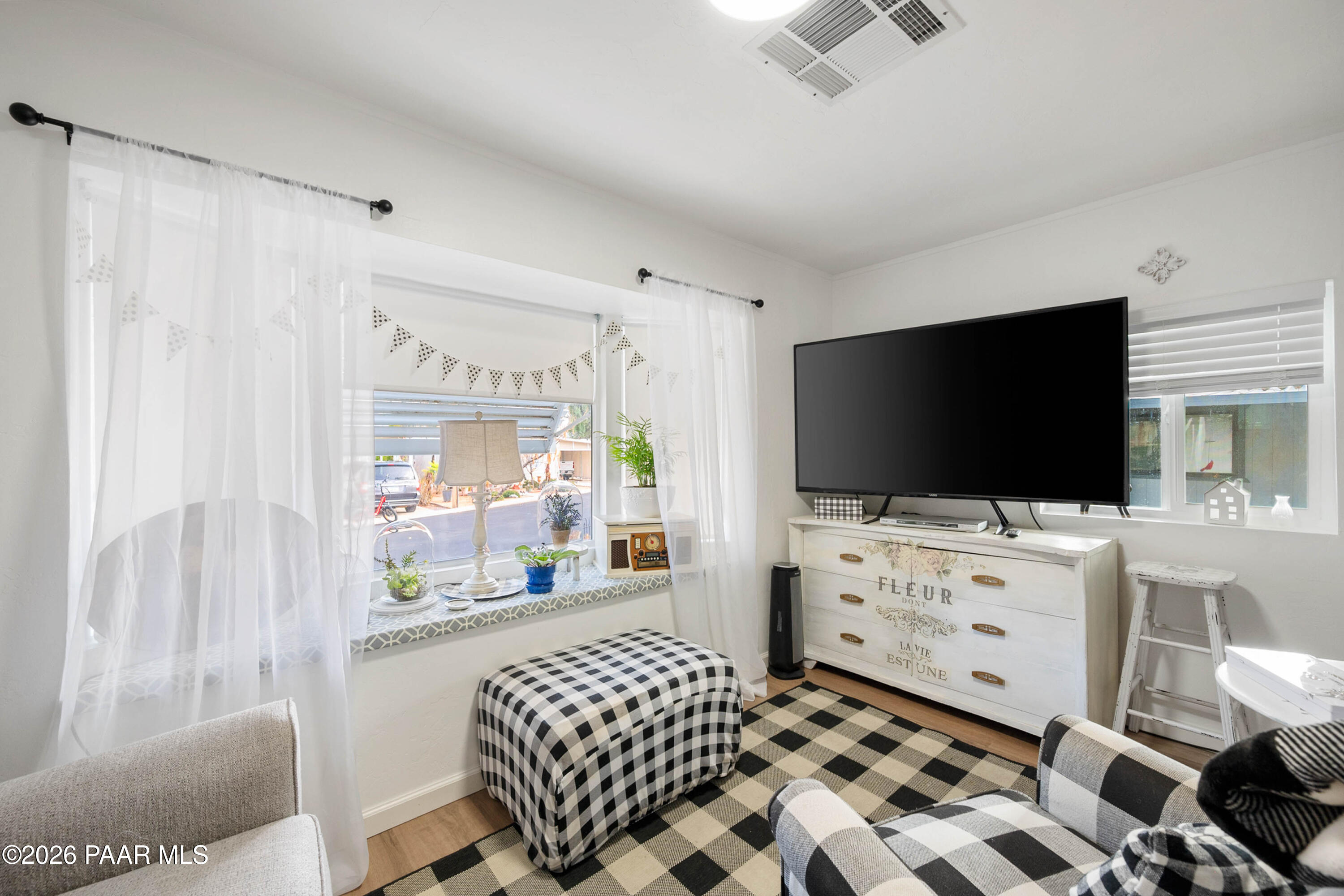 1165 Rocking M Lane Dewey, AZ 86327 - Photo 19 of 30 a bedroom with furniture and a flat screen tv