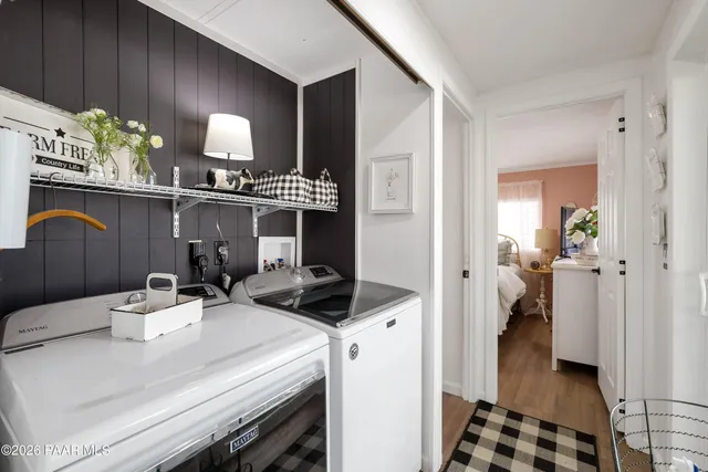a kitchen with a sink a stove and cabinets