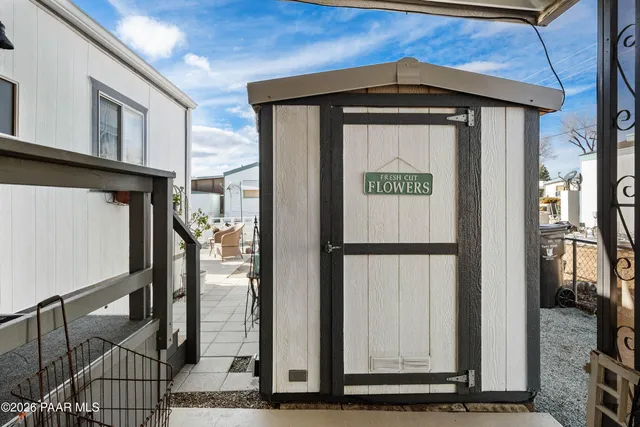 a front view of a house with parking