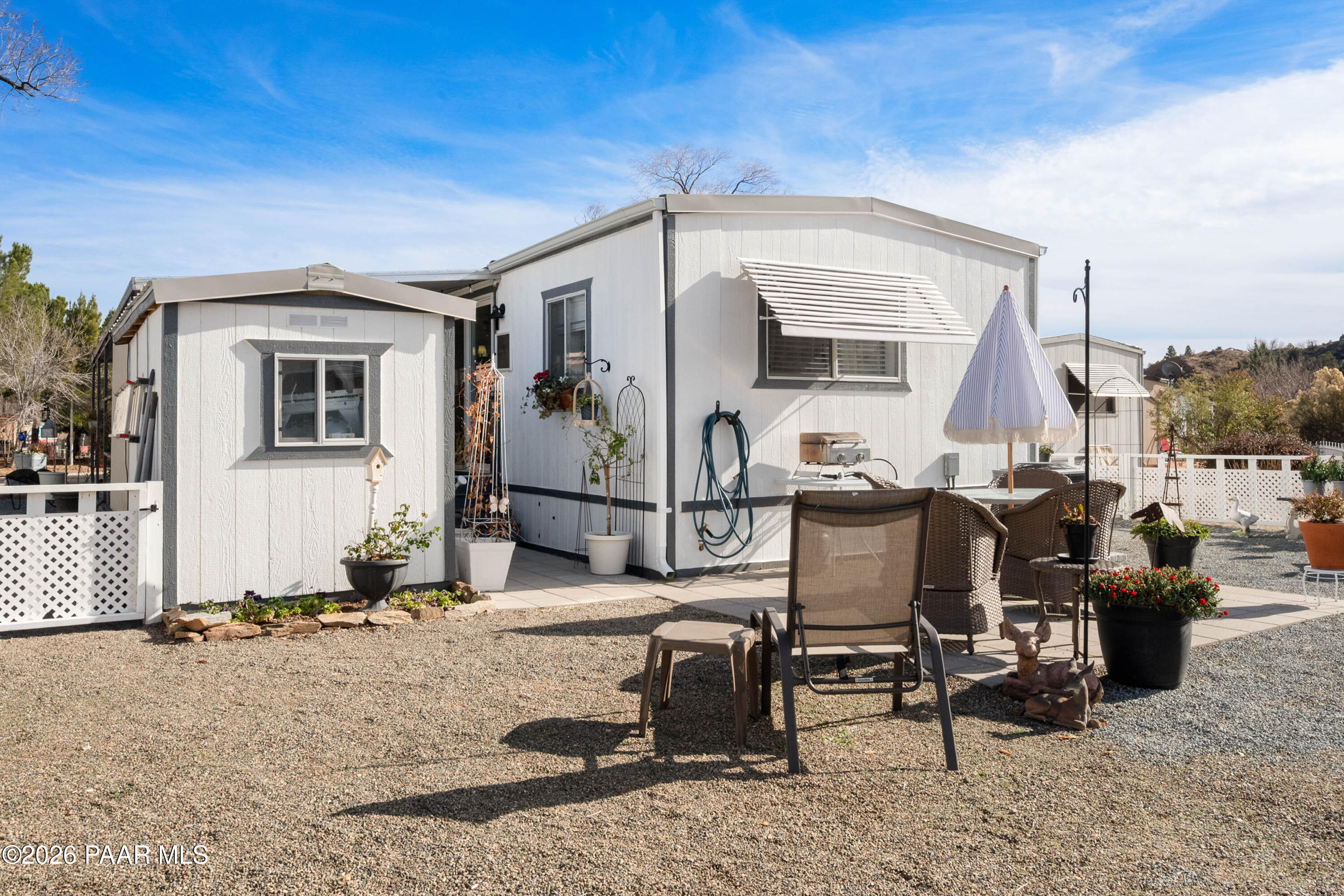 1165 Rocking M Lane Dewey, AZ 86327 - Photo 30 of 30 a view of a dinning table and chairs in the patio