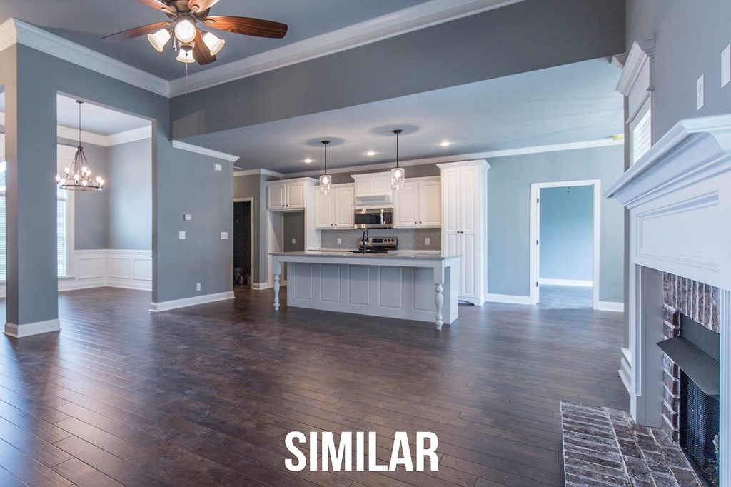 103 Timber Ridge Circle, Unit 139 Byron, GA 31008 - Photo 5 of 30 a view of kitchen with cabinets and wooden floor