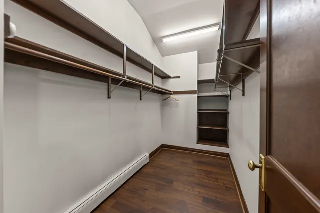 a view of an empty walk in closet