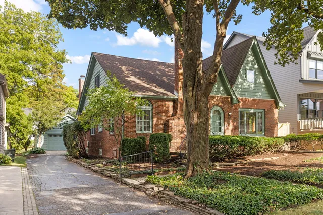 a view of house with yard
