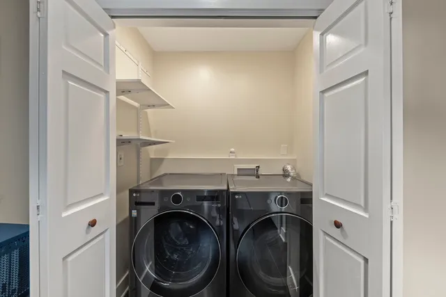 a utility room with dryer and washer