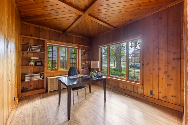a room with furniture and wooden floor