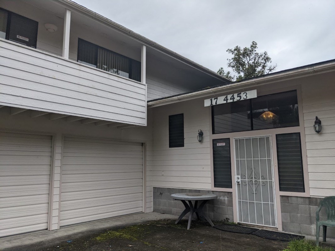 17-4455 S Road Mountain View, HI 96771 - Photo 1 of 5 a view of a house with a door and wooden bench
