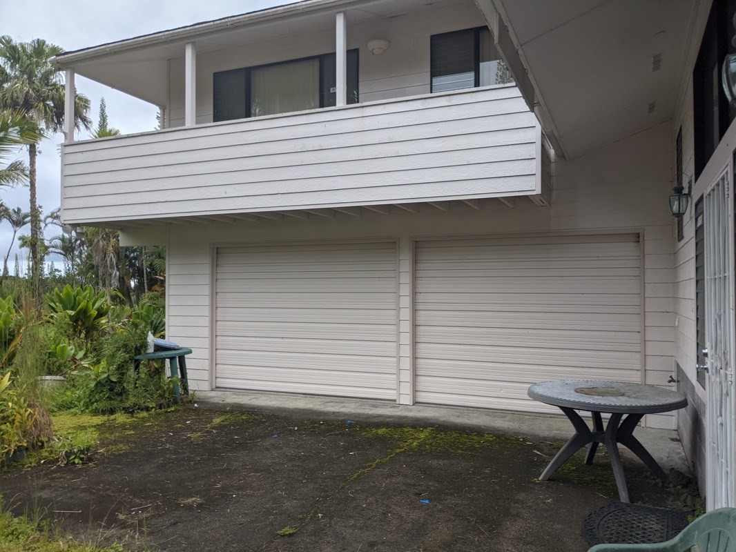 17-4455 S Road Mountain View, HI 96771 - Photo 5 of 5 a view of a house with a yard and sitting area