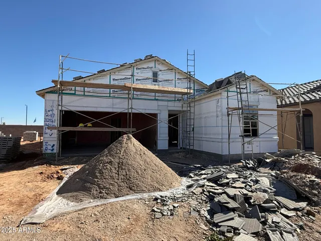 a view of a grey house