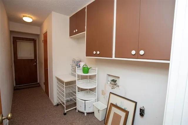 a room with a table and chairs