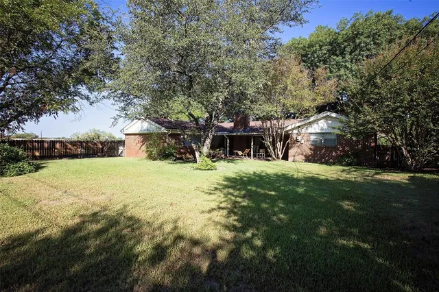 a view of house with outdoor space