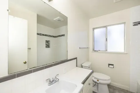 a bathroom with a sink and a toilet