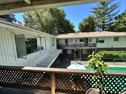 a view of a back yard of the house
