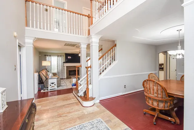a kitchen with kitchen island a refrigerator sink stove and microwave