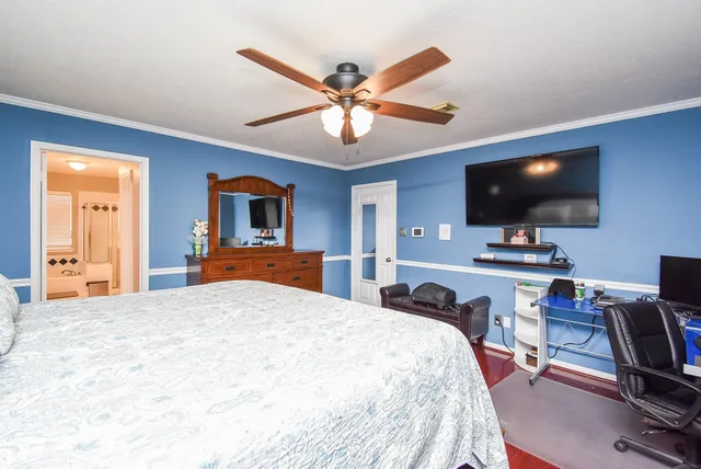 a bathroom with a glass shower door